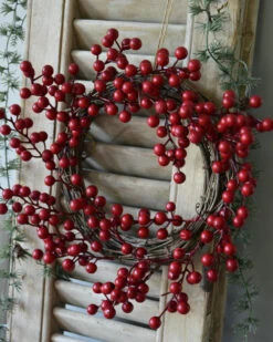 Krans Van Rode Besjes, IB Laursen